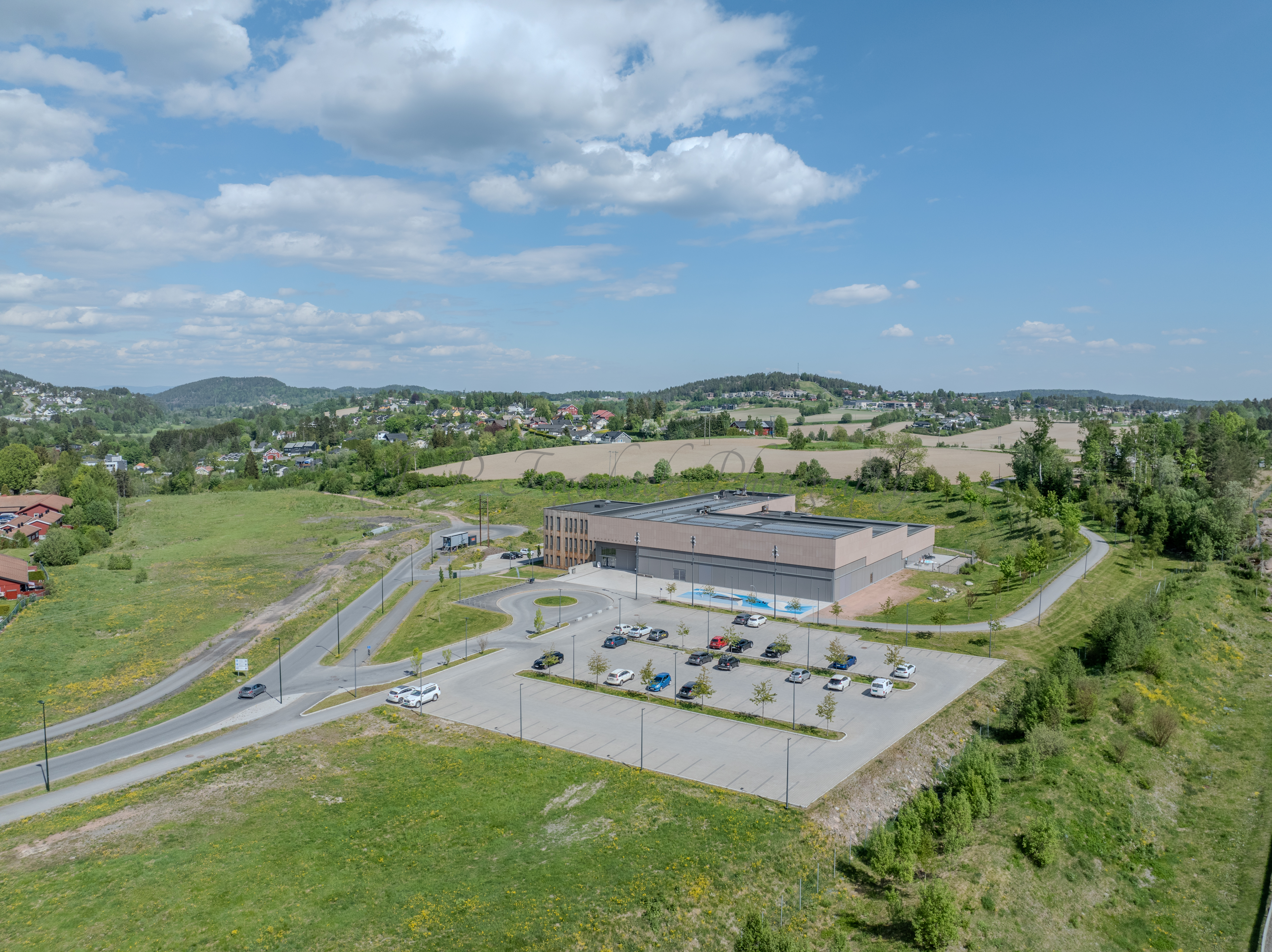 Monomental buildings in a landscape under a blue sky
