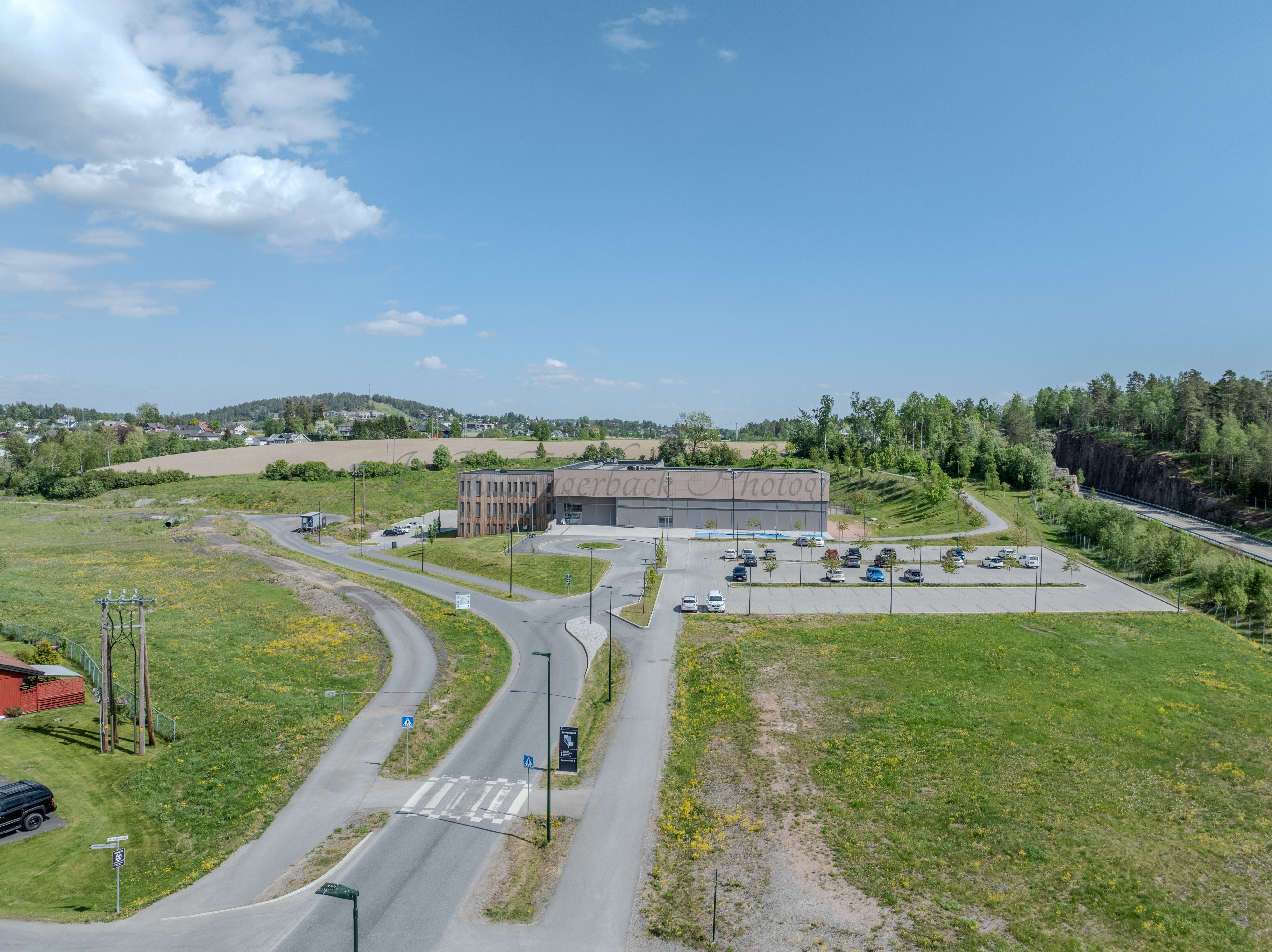 Monomental buildings in a landscape under a blue sky