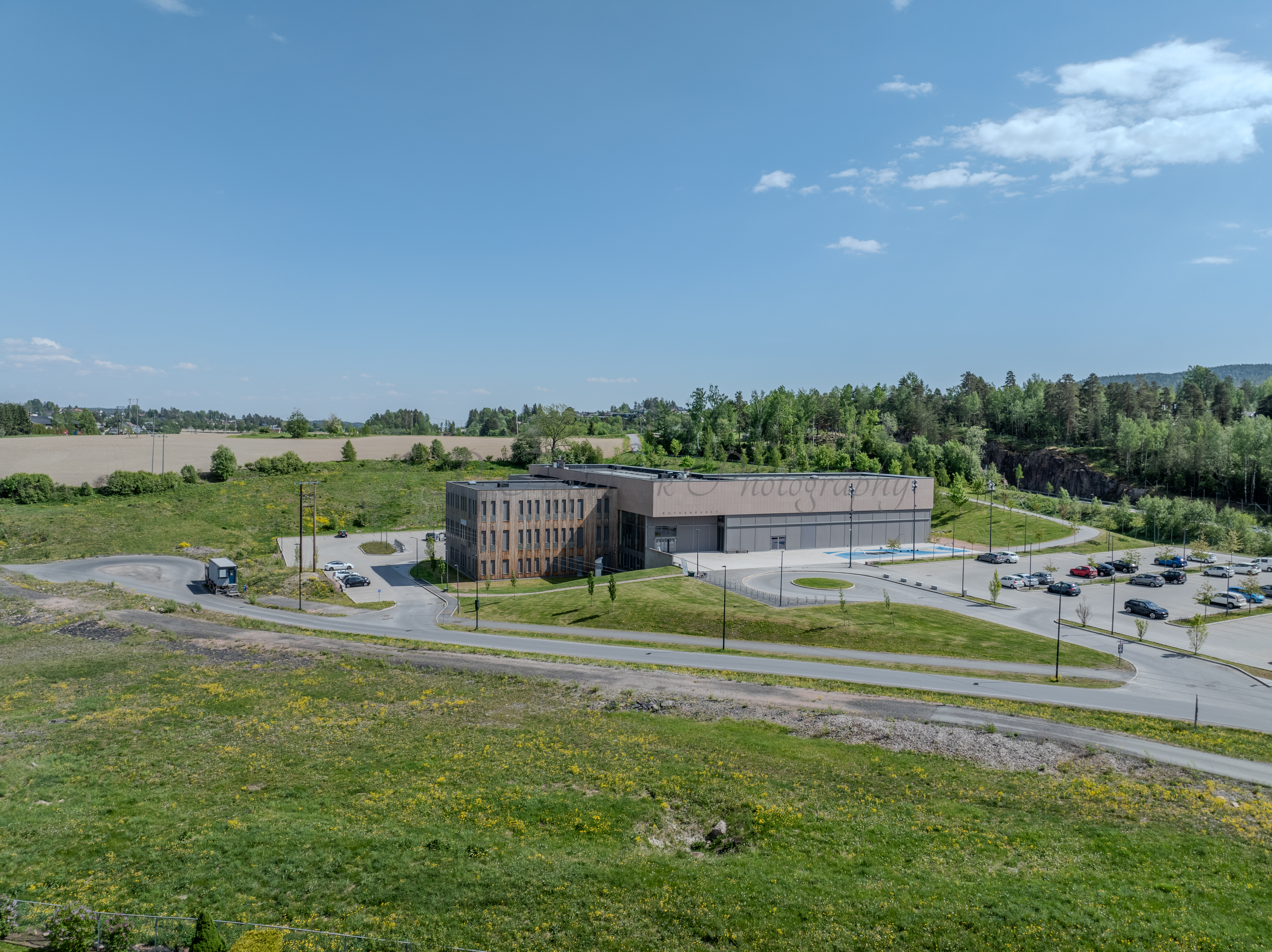 Monomental buildings in a landscape under a blue sky