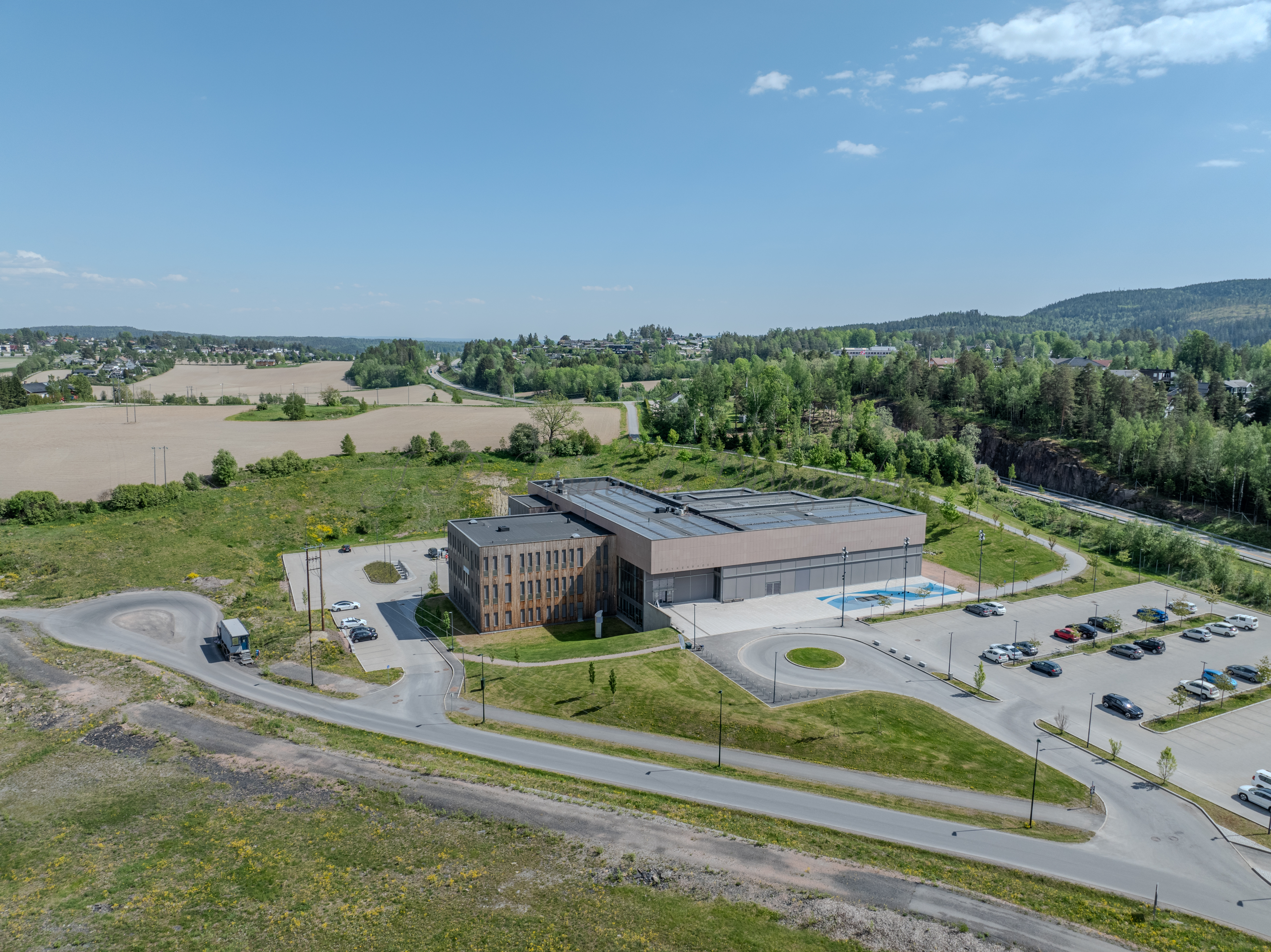 Monomental buildings in a landscape under a blue sky