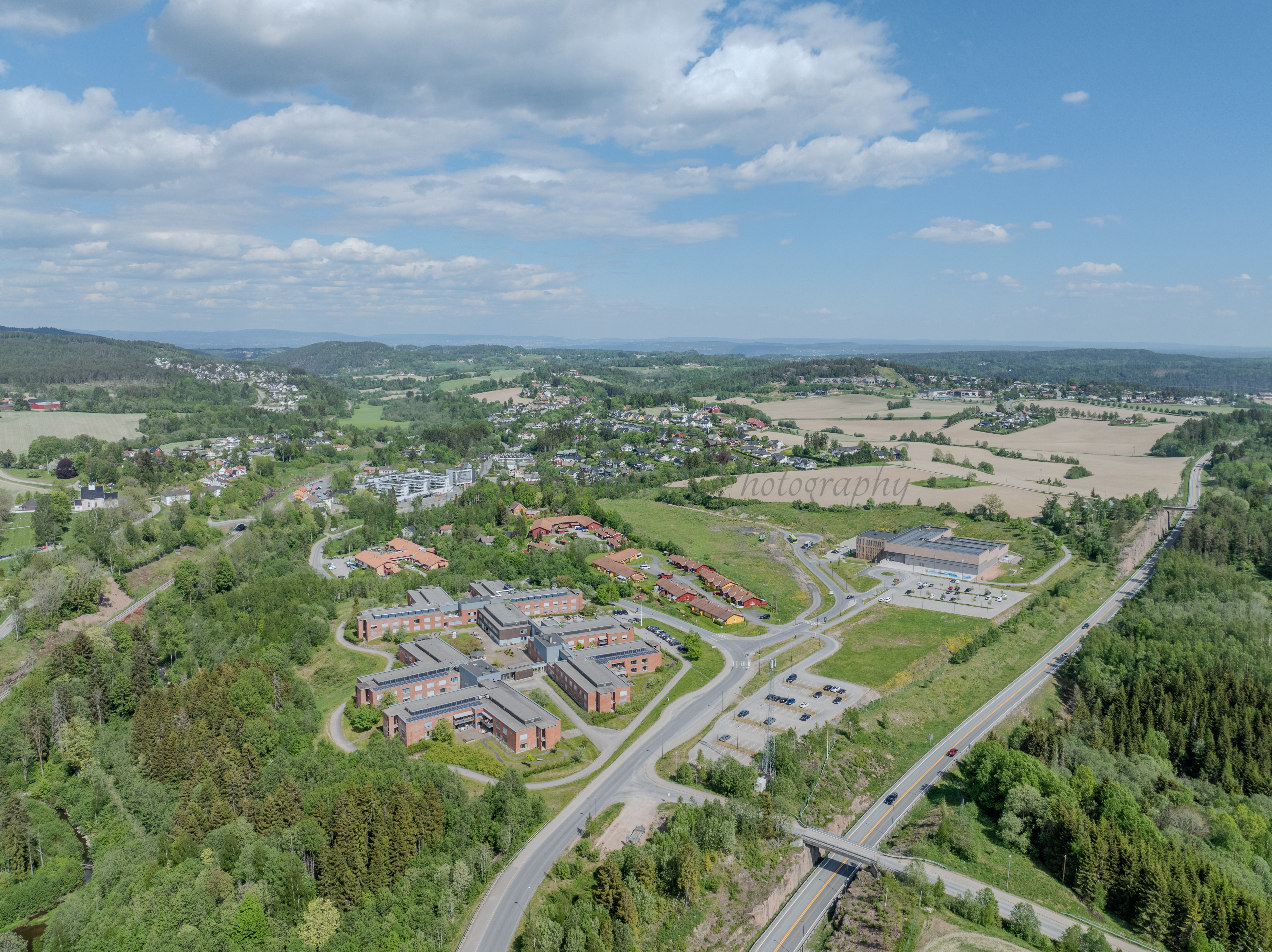 Monomental buildings in a landscape under a blue sky
