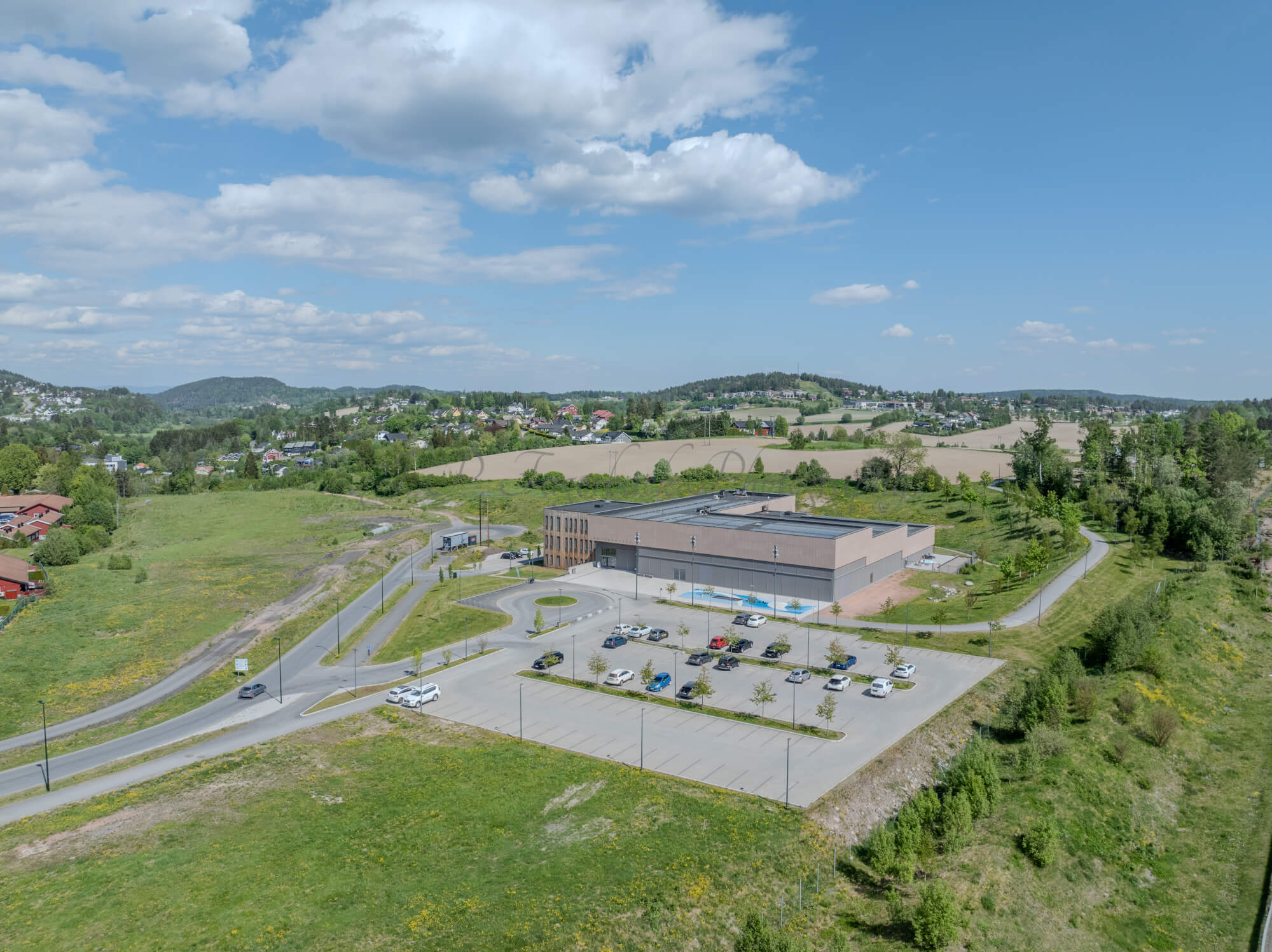 Monomental buildings in a landscape under a blue sky
