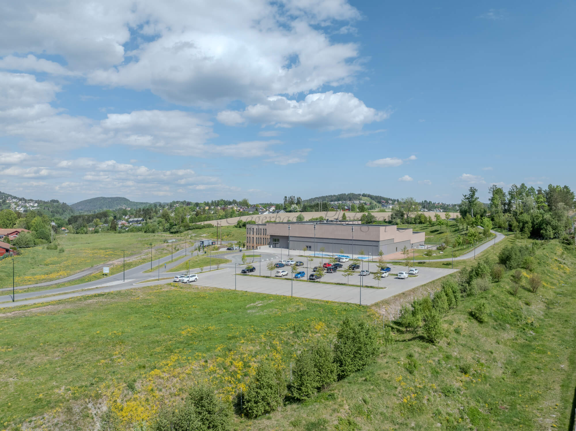 Monomental buildings in a landscape under a blue sky