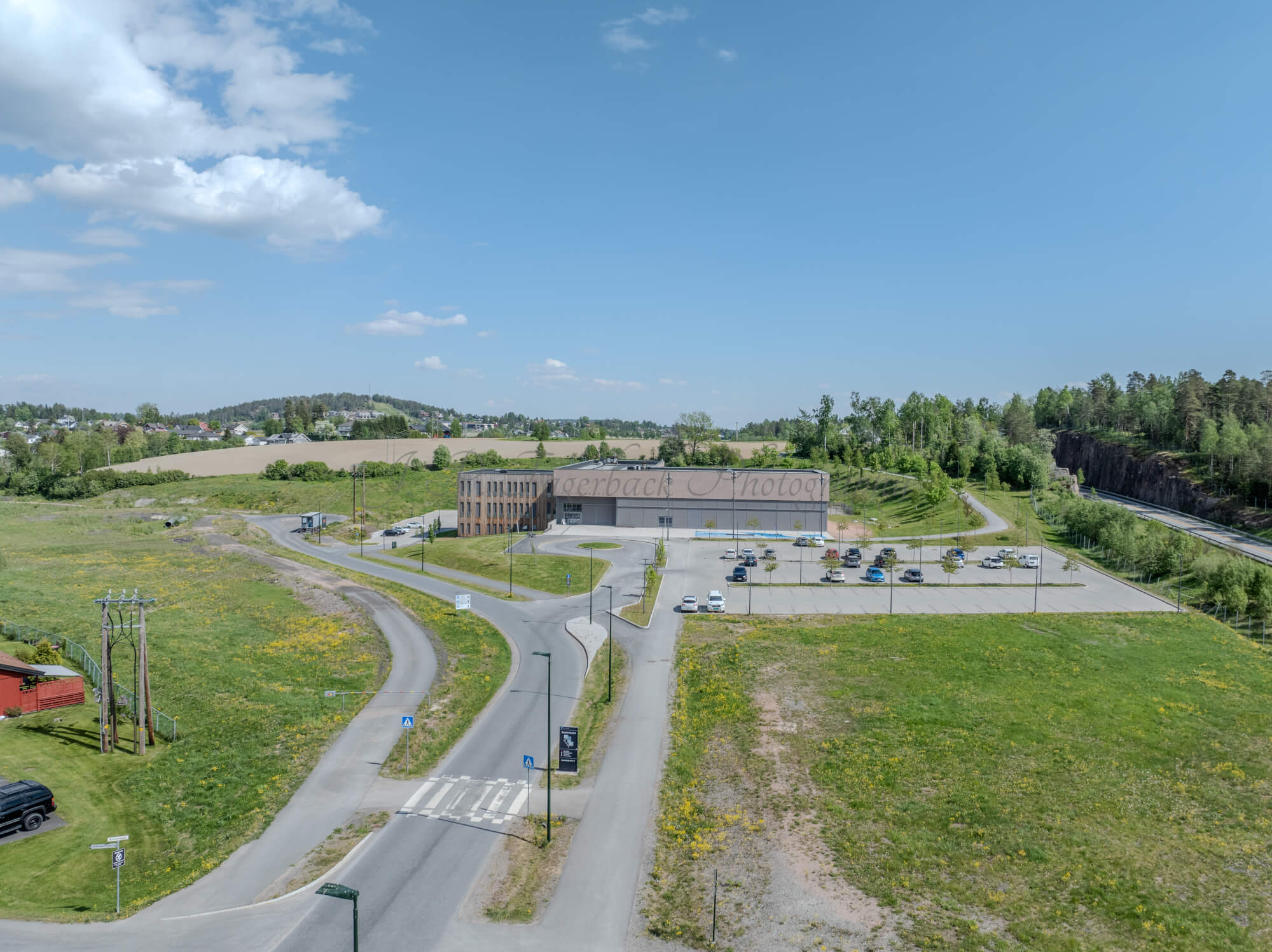 Monomental buildings in a landscape under a blue sky