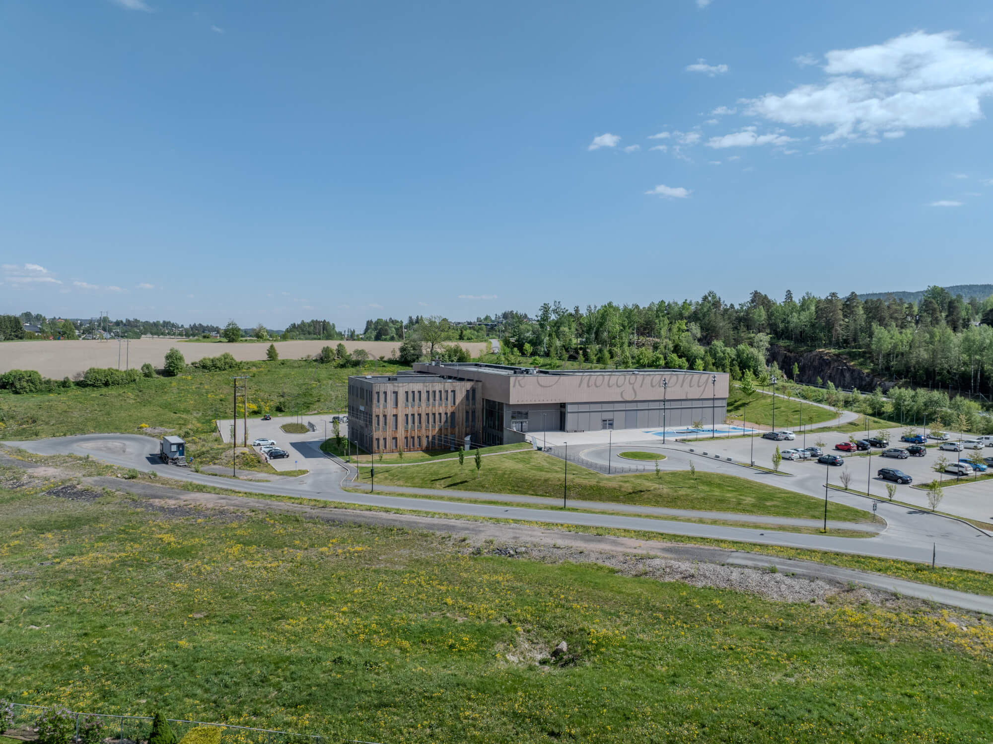 Monomental buildings in a landscape under a blue sky