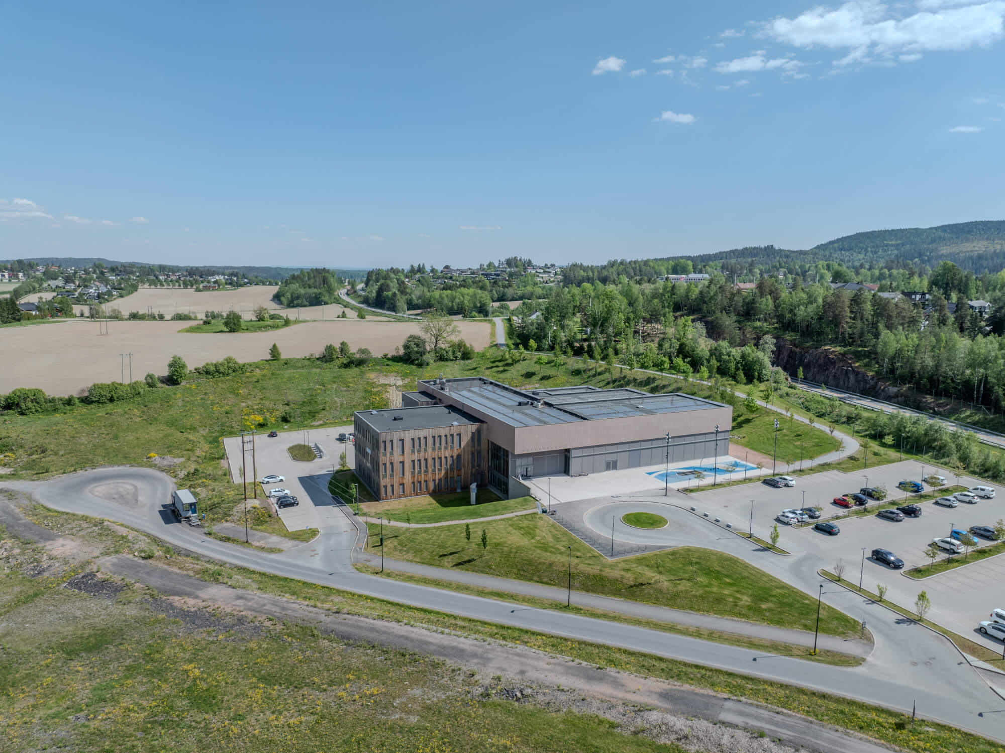 Monomental buildings in a landscape under a blue sky