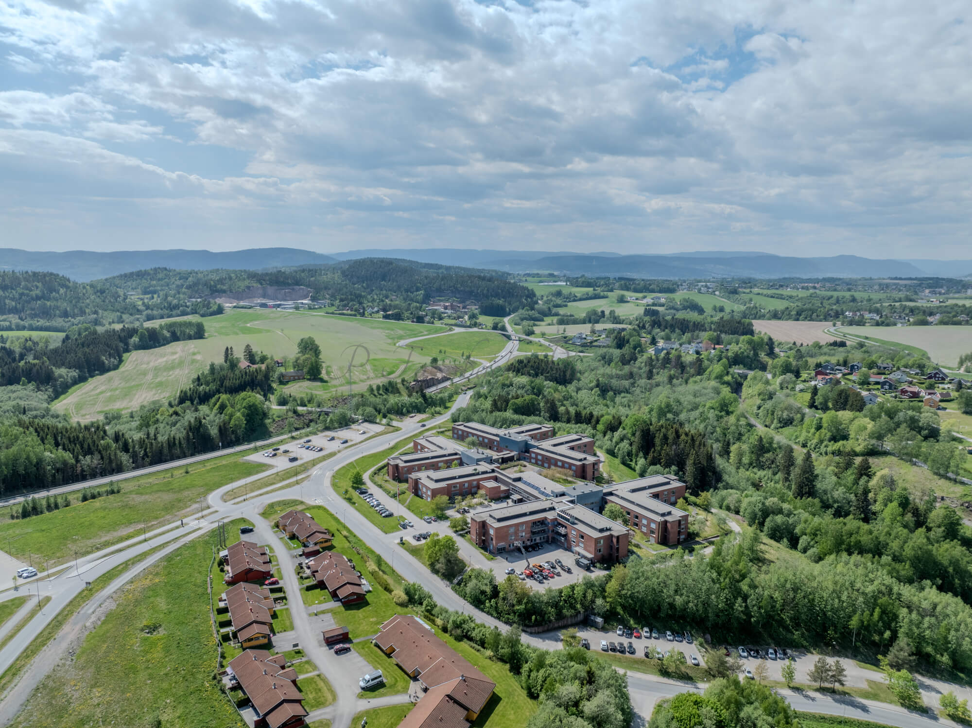 Monomental buildings in a landscape under a blue sky