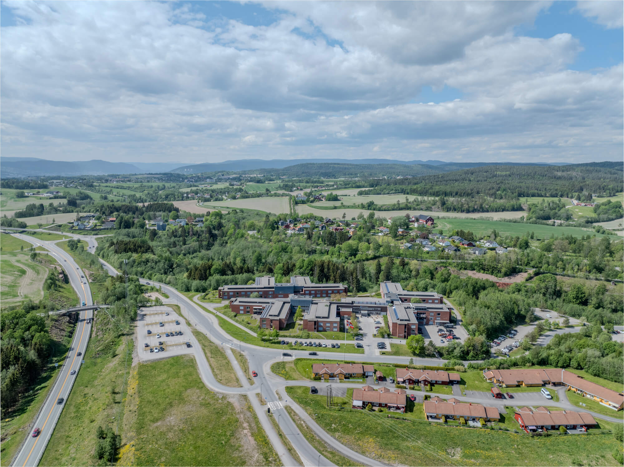Monomental buildings in a landscape under a blue sky