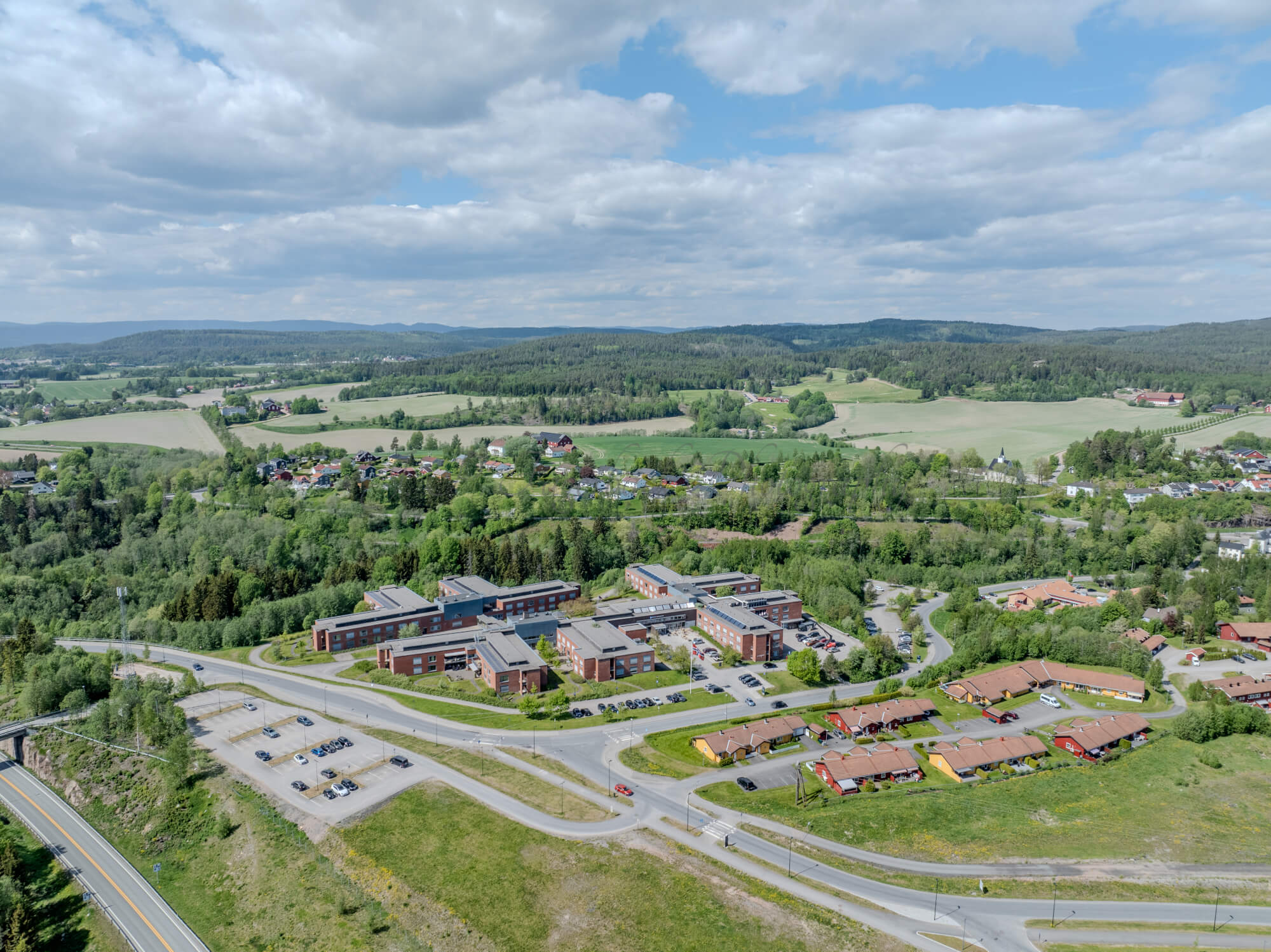 Monomental buildings in a landscape under a blue sky