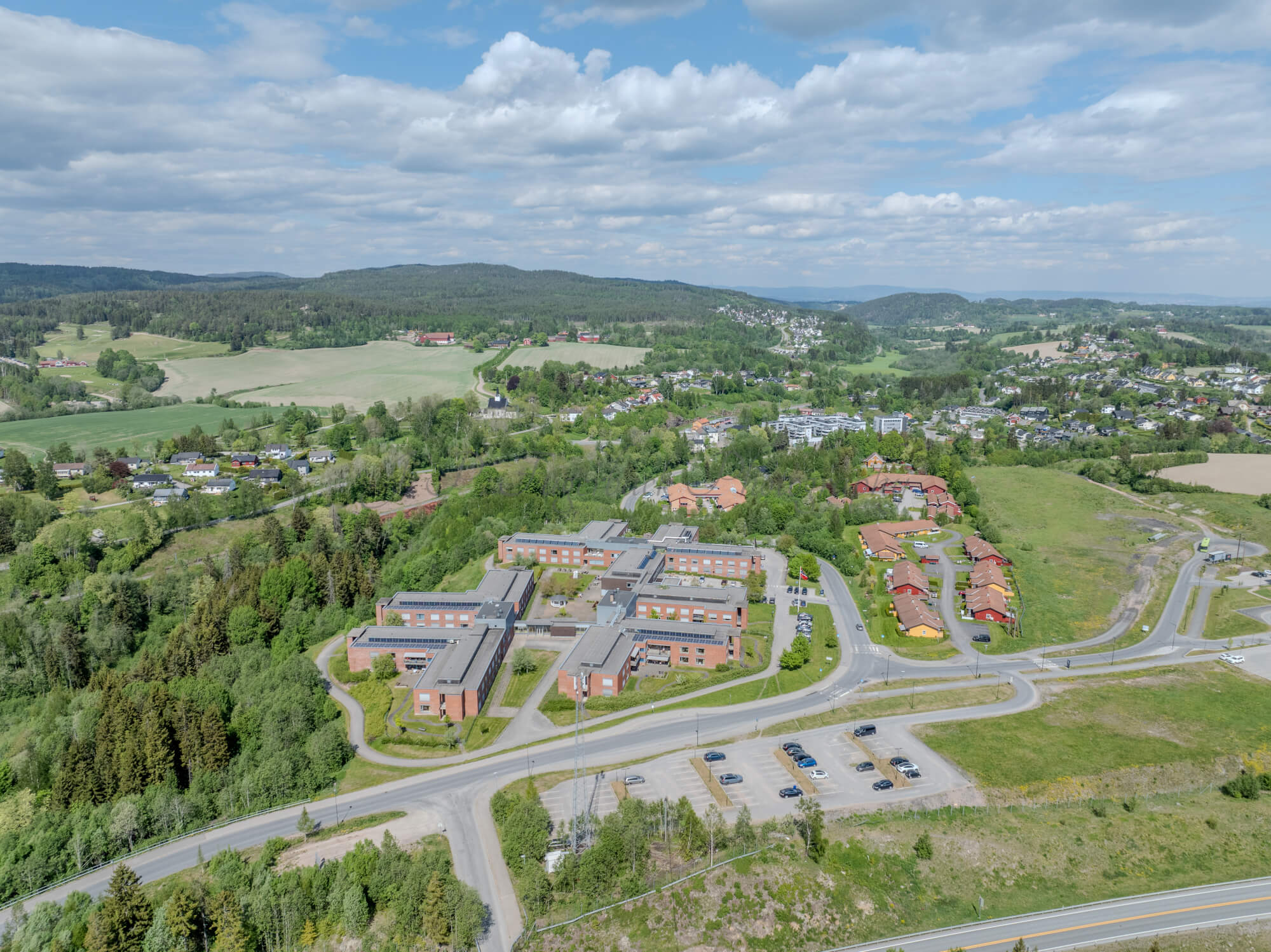 Monomental buildings in a landscape under a blue sky