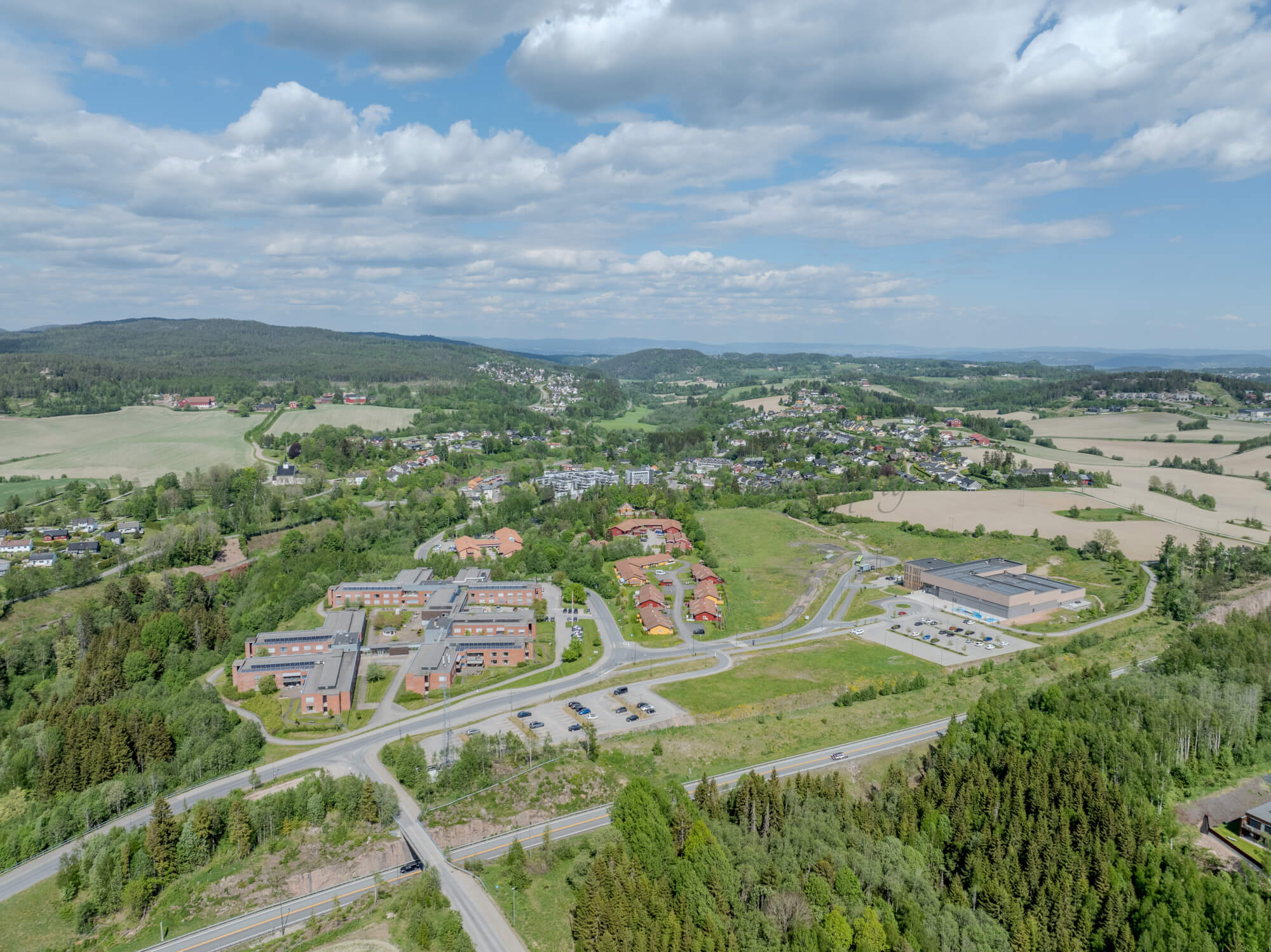 Monomental buildings in a landscape under a blue sky