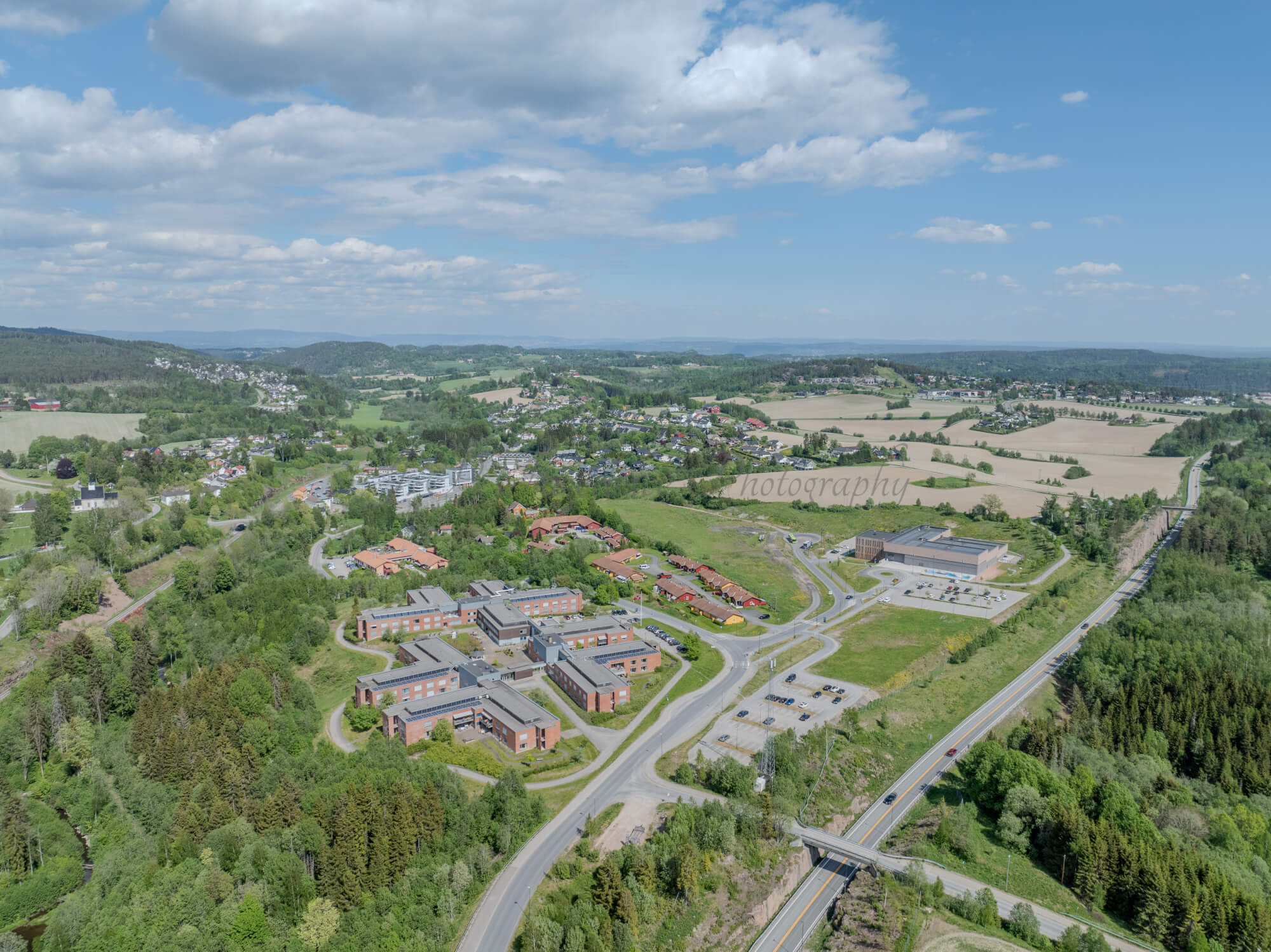 Monomental buildings in a landscape under a blue sky